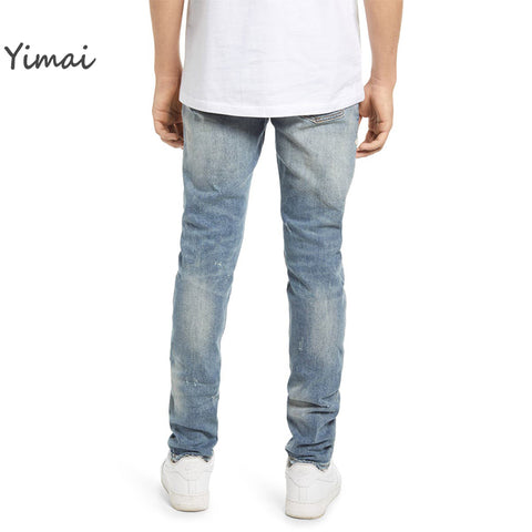 Custom men's new design streetwear distressing rip medium wash bootcut chenille embroidery jeans