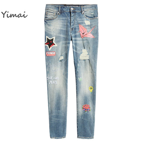 Custom men's new design streetwear distressing rip medium wash bootcut chenille embroidery jeans